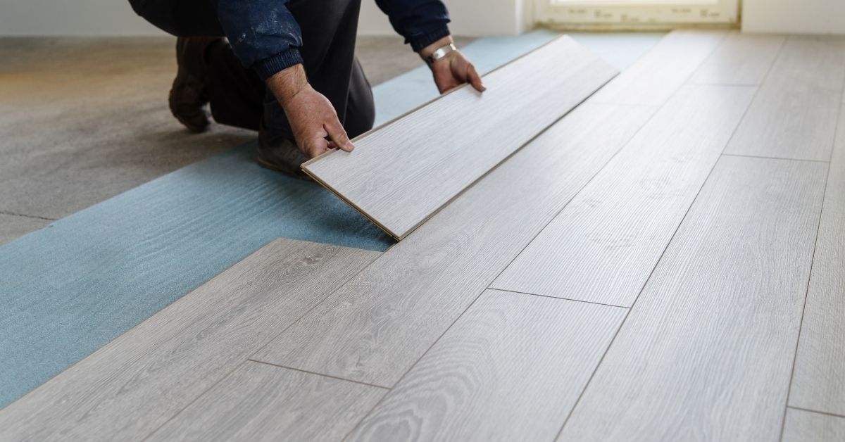 Someone fitting Laminate Flooring with Underlay